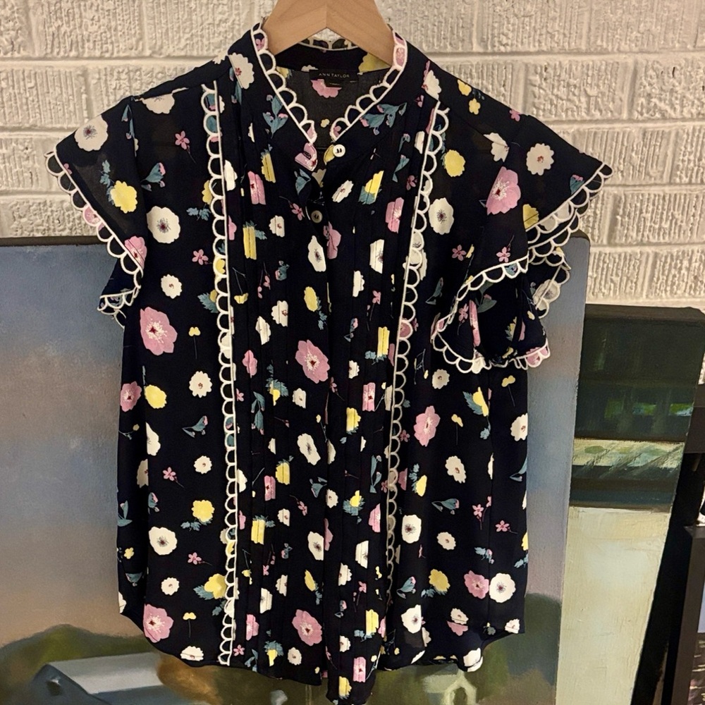 Ann Taylor blouse in deep navy. Beautiful! Gently worn. Great condition.